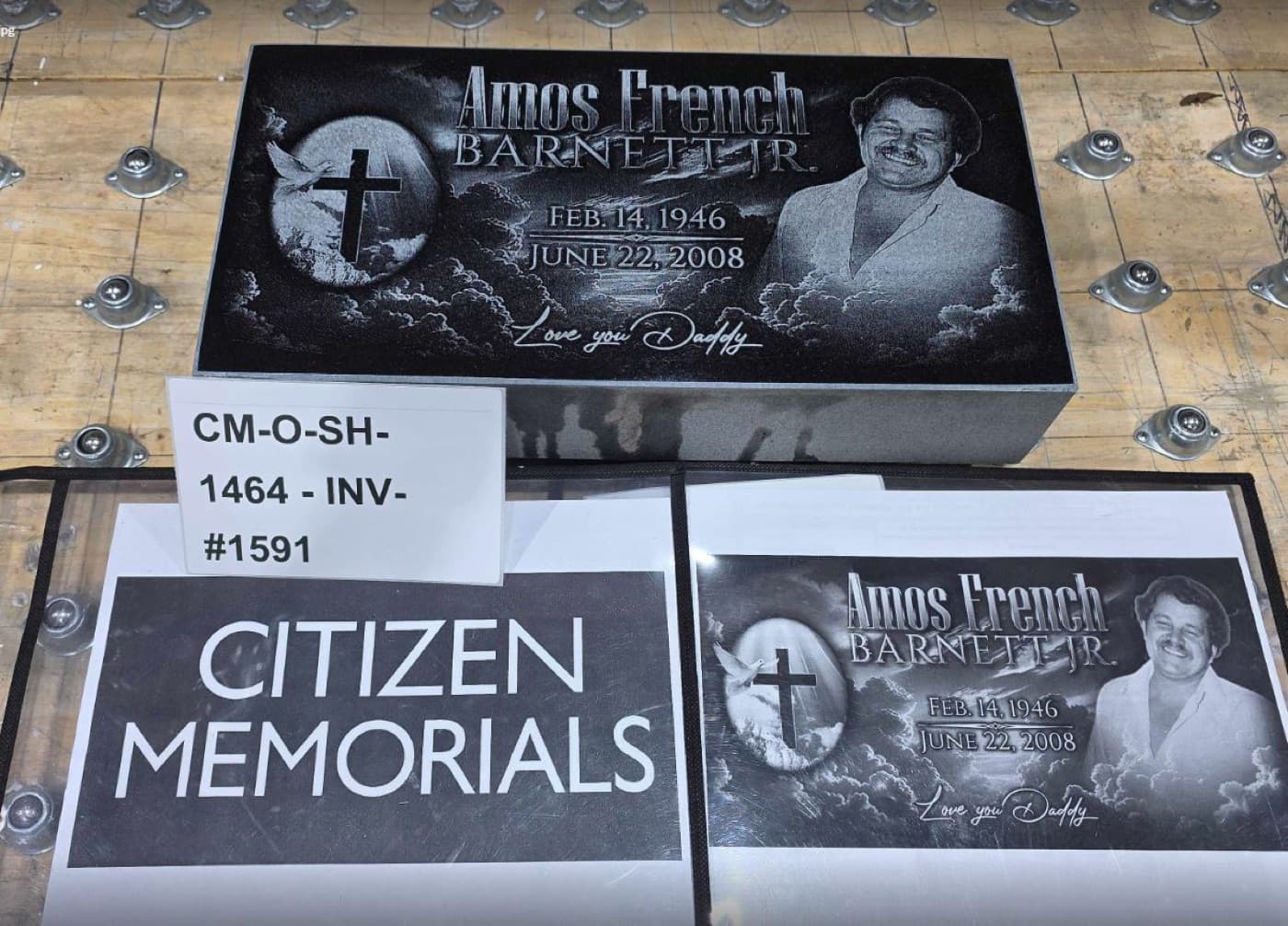 A recently completed custom black granite memorial