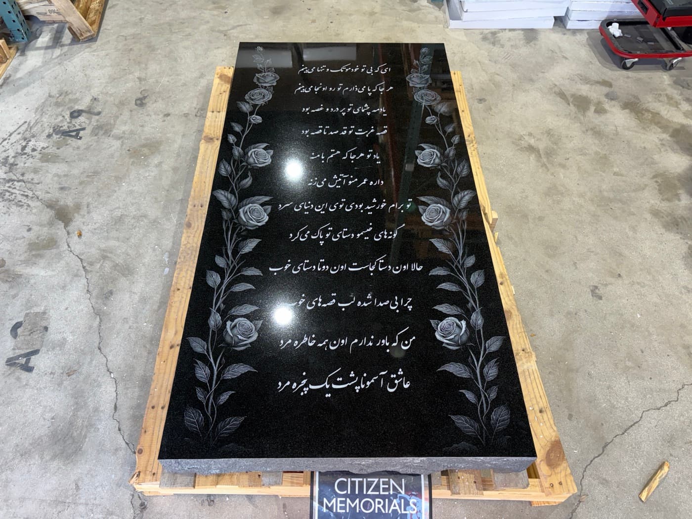Large companion flat marker with full Persian/Farsi poem engraved in flowing script, framed by detailed rose borders — no portrait