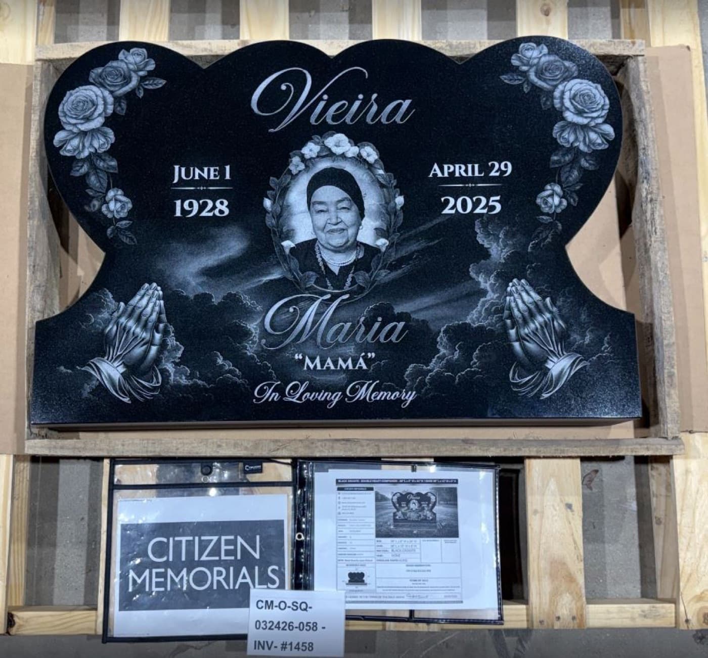 Double heart-shaped upright monument for 'Mamá' Vieira — oval portrait cameo with praying hands and detailed rose border engraving